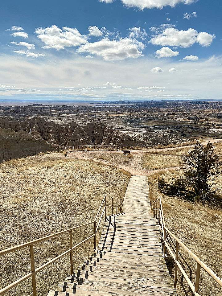 a set of stairs leading to a scenic view