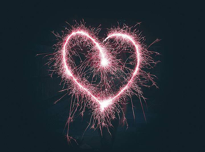 heart shaped pink sparklers photography