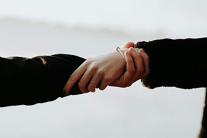 people holding hands