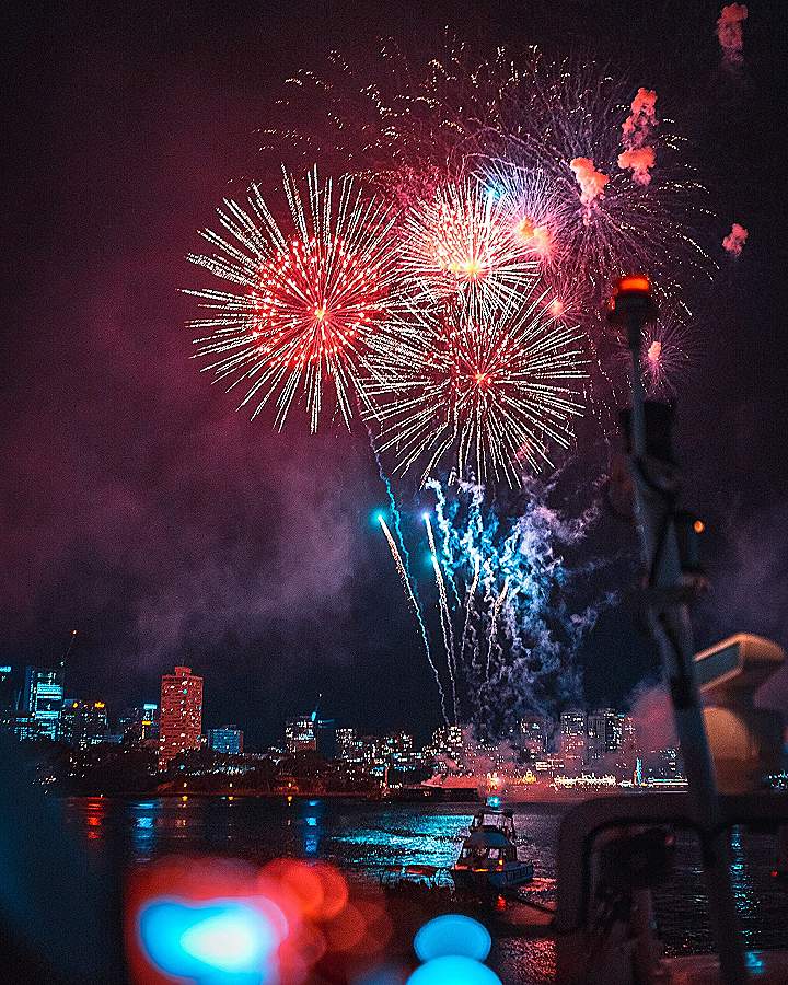 selective focus photography of fireworks display at night