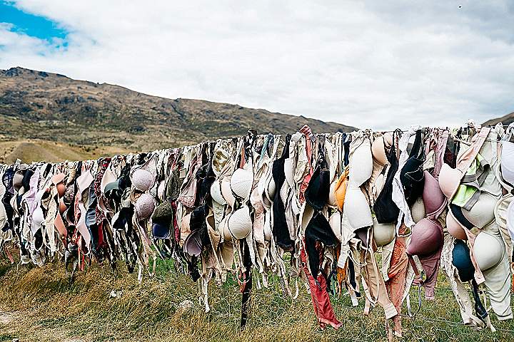 assorted bras hanged on wire