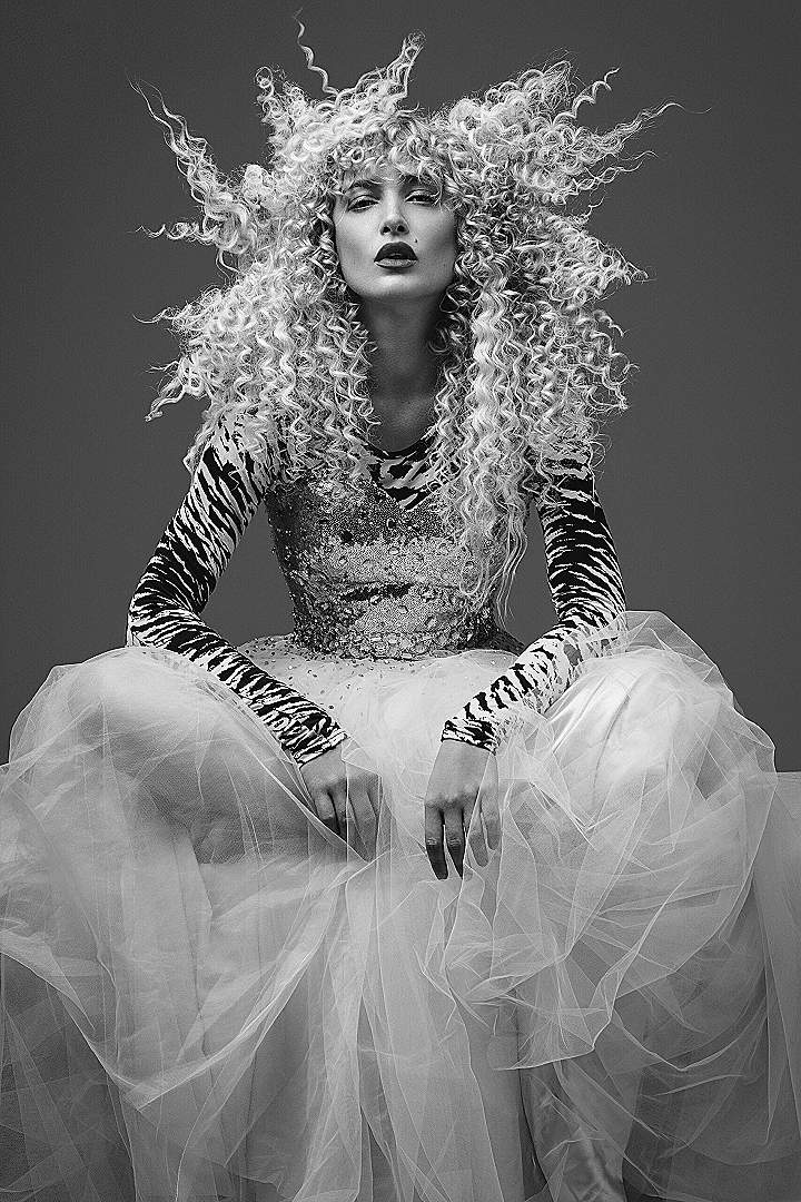 woman in black and white long sleeve dress